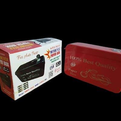 Small red waterproof motorcycle paper and document box attached to bike